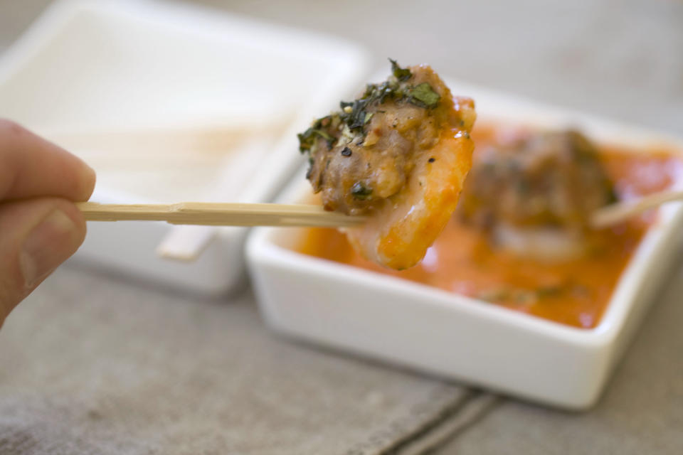 This Nov. 4, 2013 photo shows Italian surf and turf with roasted red pepper sauce in Concord, N.H. (AP Photo/Matthew Mead)