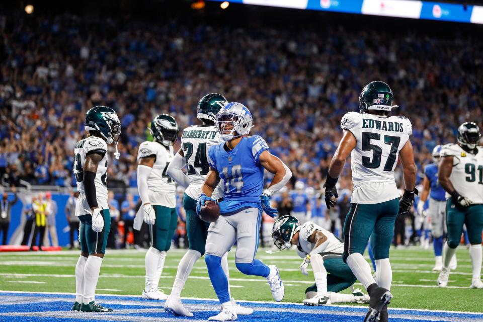 Detroit Lions receiver Amon-Ra St. Brown scores a touchdown the against Philadelphia Eagles during the second half at Ford Field, Sept. 11, 2022.