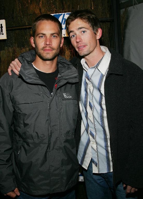 File photo taken in January 2005 shows Paul Walker and his brother Caleb at the Sundance Film Festival in Park City, Utah