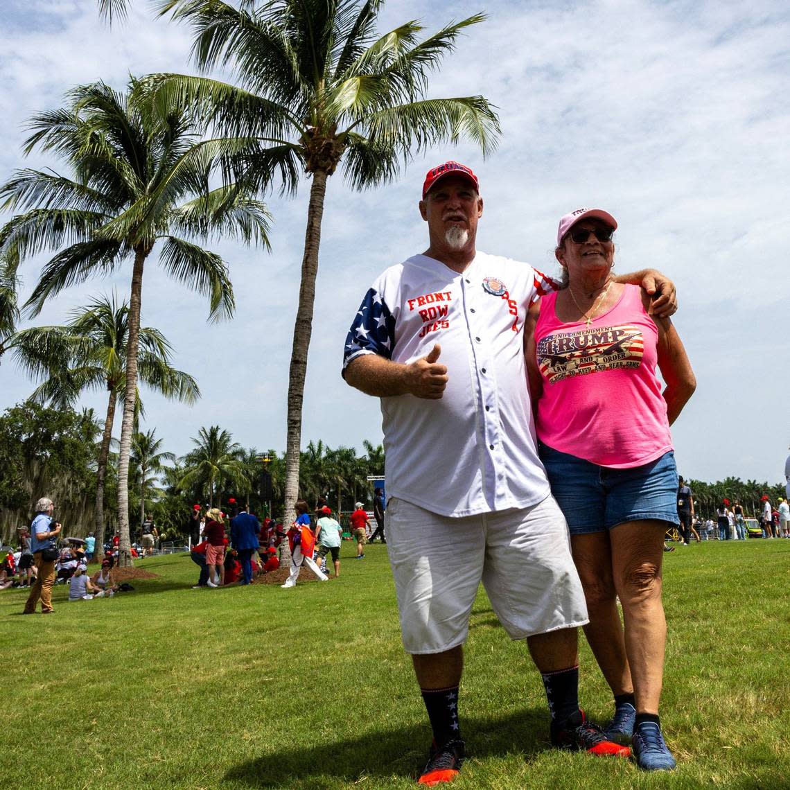 Port Richey residents Greg Reed, 51, and his wife Dianne Alghard, 62, strike a pose during a rally at Trump National on Tuesday, July 9, 2024, in Doral, Fla.