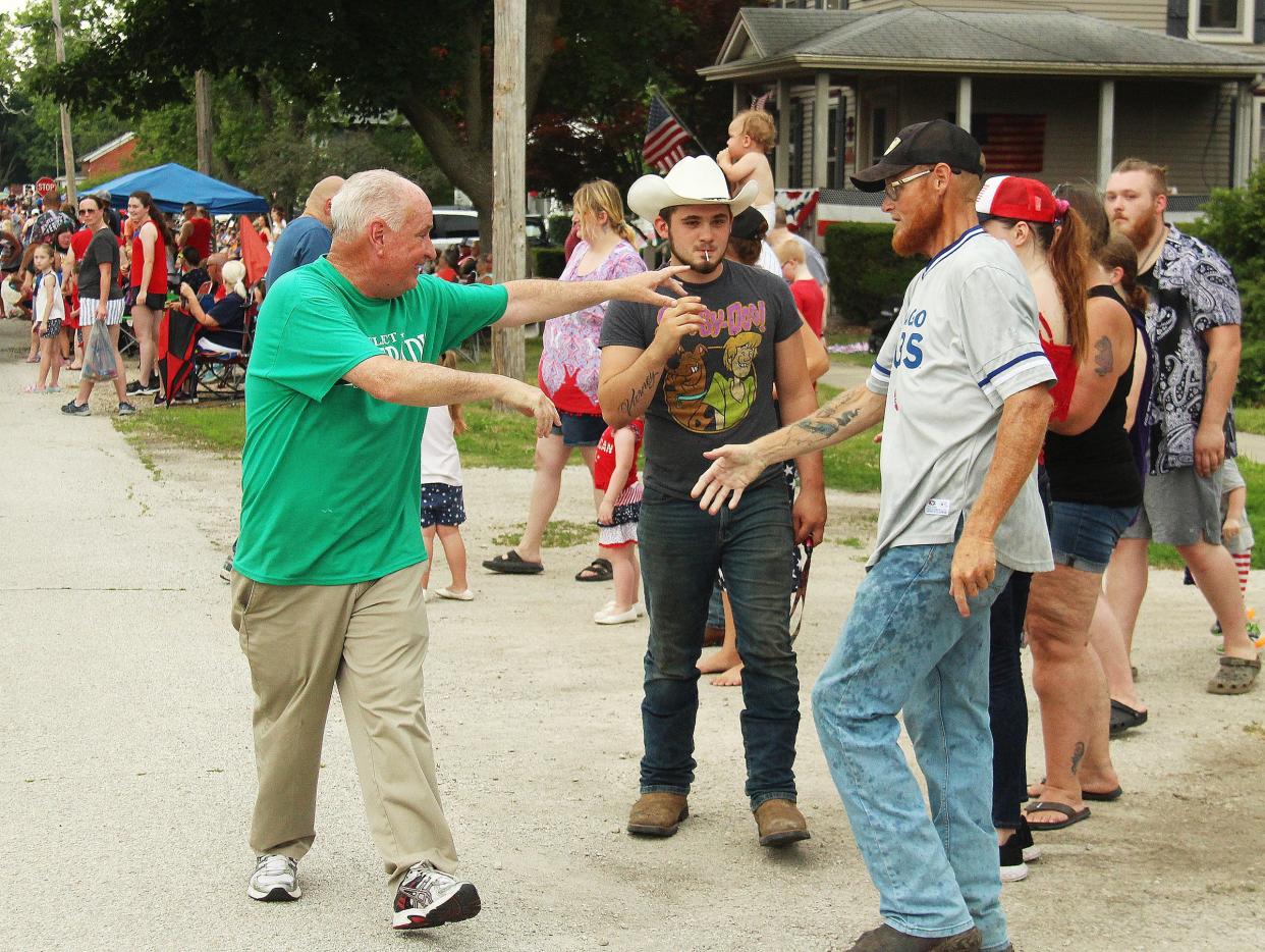 State Rep. Dan Brady meets parade goers while walking the route Monday at Chenoa. Brady recently won the Republican primary for secretary of state.