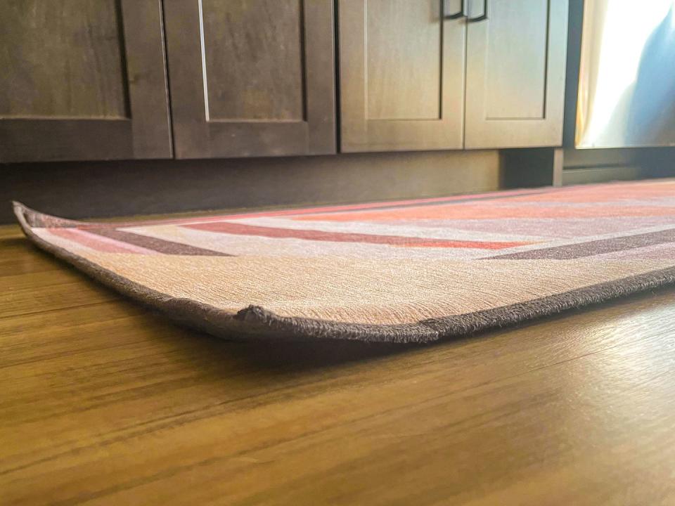 curled corners of ruggable carrot sunrise rug