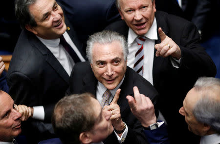 Brazil's new President Michel Temer reacts during the presidential inauguration ceremony after Brazil's Senate removed President Dilma Rousseff in Brasilia, Brazil, August 31, 2016. REUTERS/Ueslei Marcelino