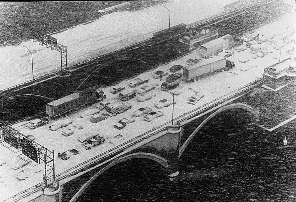 Cars litter the Washington Bridge during the Blizzard of '78, which trapped thousands on their way home from work and brought the state to a standstill. Michelle Mainelli was a child living in Providence during the blizzard, which sparked her interest in the weather.