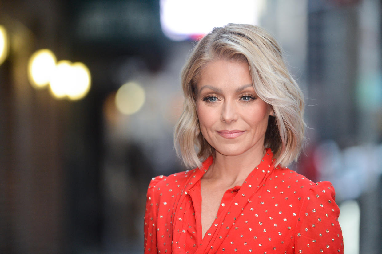 Kelly Ripa in red blouse