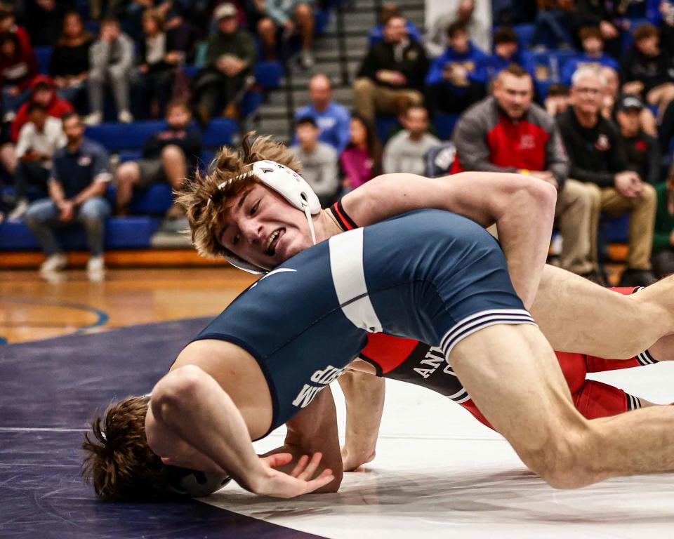 Cael Harter (AC) wrestles Zach Landis (MTWP) during the 133 lb match. Landis won by decision, 9-4. The two-day LL League wrestling championships concluded Saturday, Jan. 28, 2023 at Manheim Township.