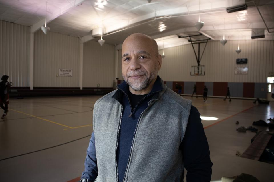 On a recent Saturday afternoon in November, Hans Hageman opens the gymnasium so kids can play basketball. (Charles Coleman)