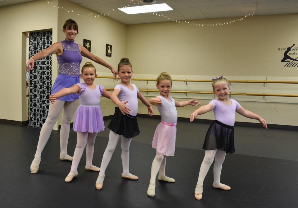 Director of Dance Kassandra Ringle, left, dances with, from left, Rylea Robles, Josephine Keegan, Harmony Snyder and Quinn Neisler.