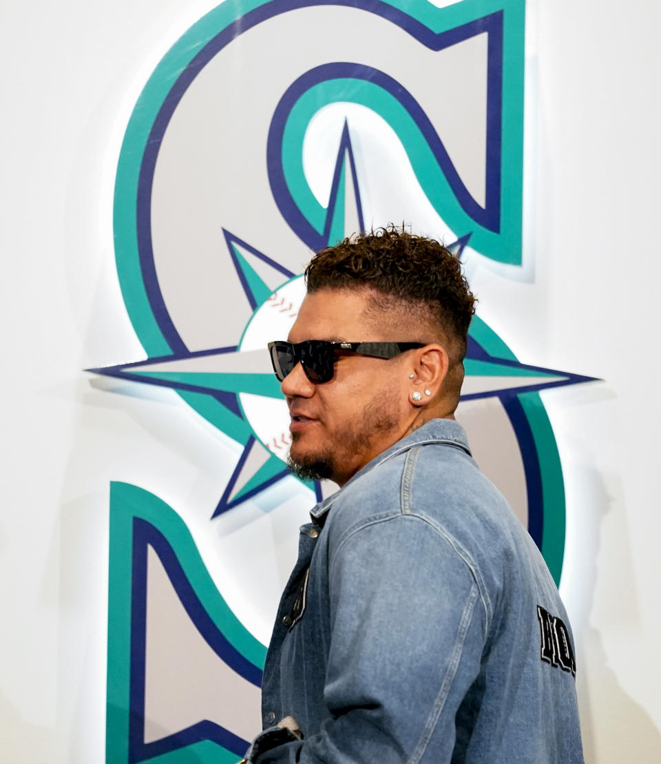 Former Seattle Mariners pitcher Felix Hernandez arrives for a media availability before a baseball game between the Mariners and the Baltimore Orioles, Friday, Aug. 11, 2023, in Seattle. Hernandez will be inducted into the Mariners Hall of Fame on Aug. 12. (AP Photo/Lindsey Wasson)