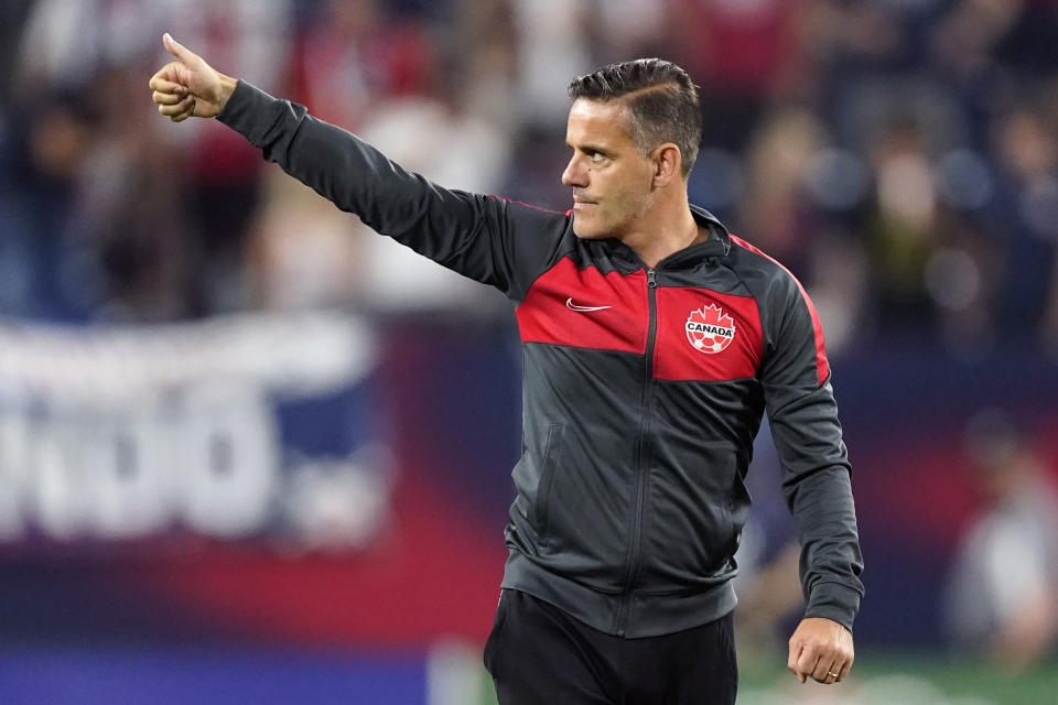 Canada head coach John Herdman salutes the crowd as he leaves the pitch following a 1-1 draw against the United States in a World Cup soccer qualifier Sunday, Sept. 5, 2021, in Nashville, Tenn. (AP Photo/Mark Humphrey)