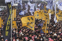 FILE - Doctors stage a rally against the government's medical policy in Seoul, South Korea, Sunday, March 3, 2024. As South Koreans prepare to vote for a new 300-member parliament next week, many are choosing their livelihoods and other domestic topics as their most important election issues. This represents a stark contrast from past elections, which were overshadowed by security and foreign policy issues like North Korean nuclear threats and the U.S. security commitment. (AP Photo/Ahn Young-joon, File)