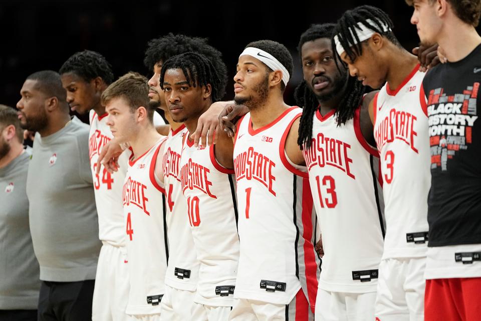 Feb 9, 2023; Columbus, OH, USA;  Ohio State Buckeyes players stand for “Carmen Ohio” after their 69-63 loss to the Northwestern Wildcats in the NCAA men’s basketball game at Value City Arena. Mandatory Credit: Adam Cairns-The Columbus Dispatch