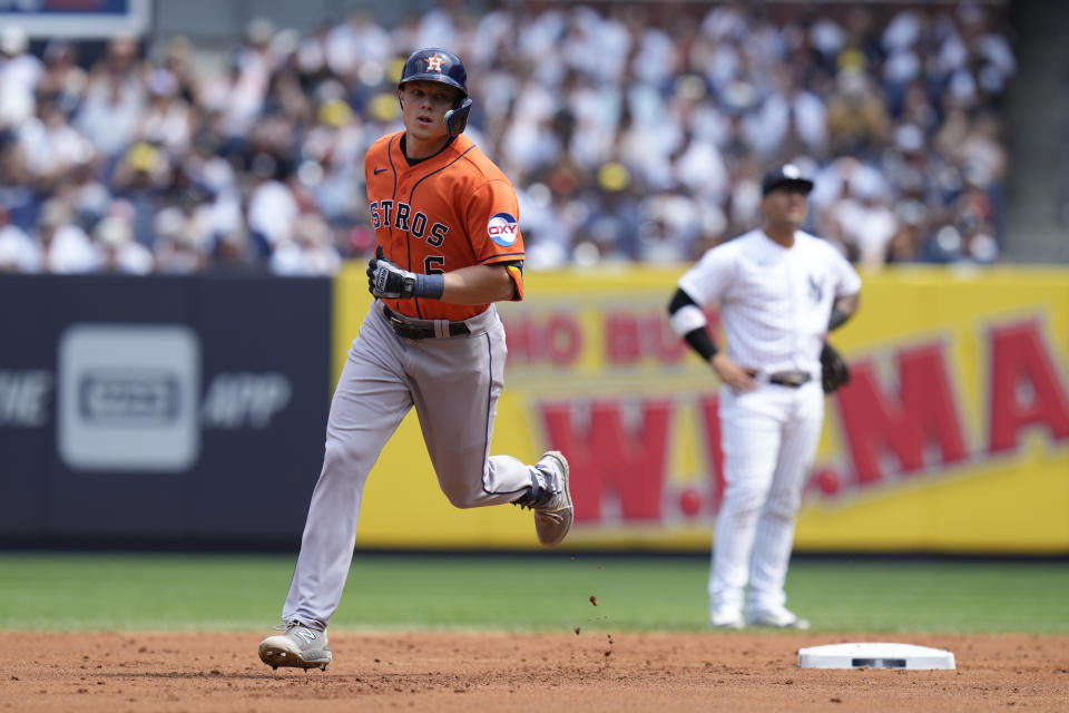 Houston Astros' Jake Meyers, left, rounds the bases after hitting a three-run home run during the second inning of a baseball game against the New York Yankees at Yankee Stadium, Sunday, Aug. 6, 2023, in New York. (AP Photo/Seth Wenig)