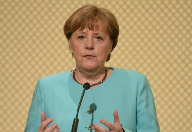 German Chancellor Angela Merkel denies having a hand in the decision to ban rallies by Turkish ministers