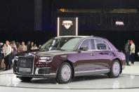 <p>Vladimir Putin clearly insisted on his presidential cars being Russian rather than German, so an armoured limo was built for him in the shape of the Aurus Senat. Oddly, it has the body shape, lights, rear and grille of a Rolls-Royce Phantom, but underneath it has a <strong>598bhp</strong> 4.4-litre hybrid <strong>V8</strong>, designed with the help of both Porsche and Bosch. Its<strong> $160,000 </strong>price tag is a fair bit cheaper than the luxurious Brit’s, however. </p>