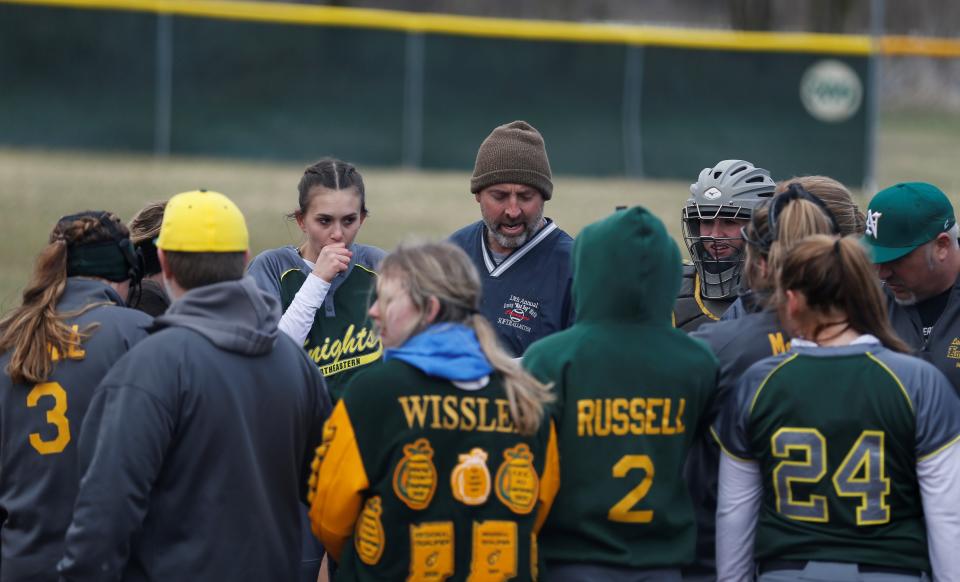 Northeastern head coach Todd Wilson talks to his team before taking the field for a scrimmage against National Trail March 25, 2022.