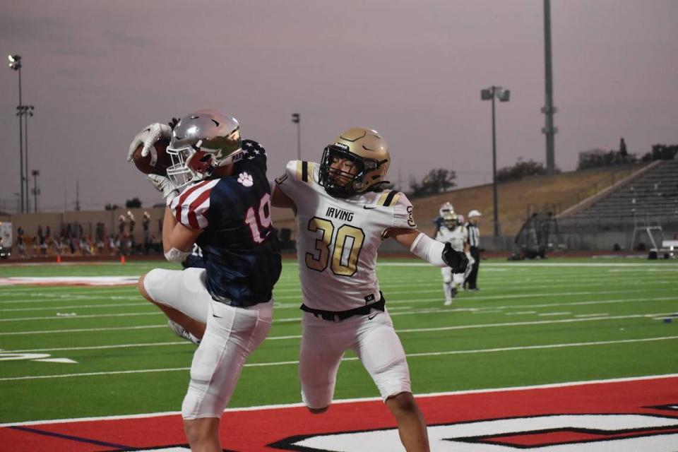 Paschal’s Tight End Luke Tevis (19) coming down with a perfectly placed pass for a touchdown during a high school football game against Irving at Clark Stadium in Fort Worth, Texas, Thursday, August 24, 2023.