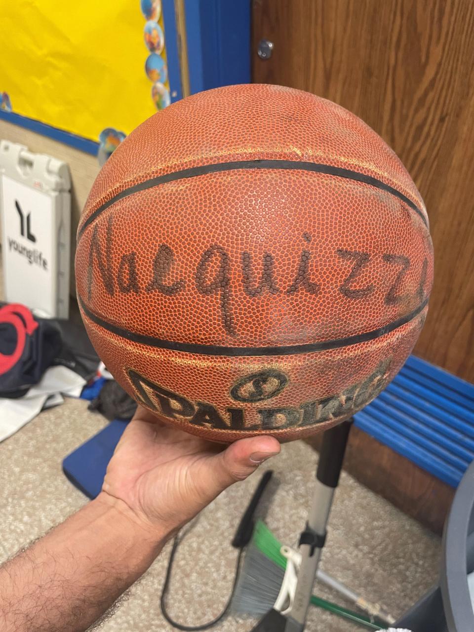 Memphis forward Nae'Qwan Tomlin had this basketball confiscated during his senior year at Urban Assembly School for Green Careers in Harlem, N.Y., where it remains (inscribed by Tomlin with his then-nickname) today.