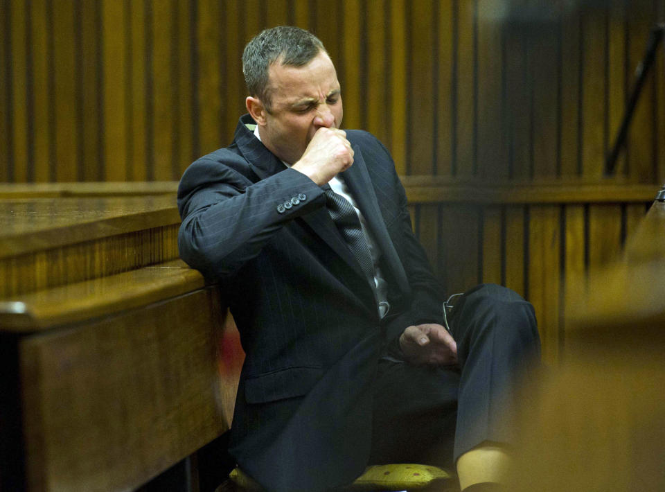 Oscar Pistorius yawns as he listens to forensic evidence being given in court in Pretoria, South Africa, Thursday, April 17, 2014. One of Oscar Pistorius’ defense experts was grilled by the chief prosecutor for the second day at the Olympic runner’s murder trial Thursday, with forensic specialist Roger Dixon’s expertise and professionalism in conducting various tests regarding Reeva Steenkamp’s shooting death again sternly questioned. Pistorius is charged with premeditated murder for shooting Steenkamp multiple times on Feb. 14, 2013. Prosecutors say that he killed Steenkamp after a fight. The trial was adjourned until May 5. (AP Photo/Alet Pretorius, Pool)