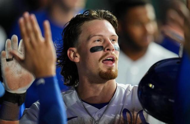 Royals star Witt Jr. flies around the bases for an inside-the-park homer