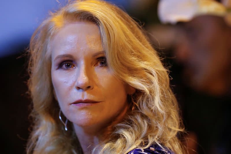 International Organization for Migration Project Manager Michelle Barron looks on during a ceremony to announce a new Venezuelan integration program in Brazil, in Brasilia