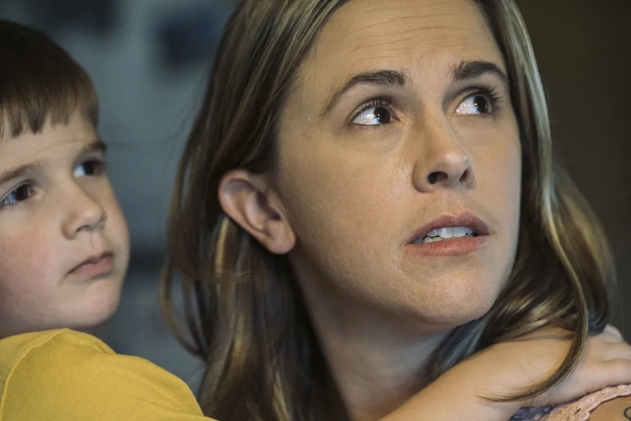 Jessica Conard with her son in East Palestine, Ohio, Oct. 1, 2023. (Andrew Spear/The New York Times)