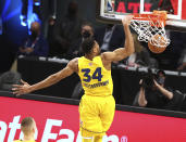 MVP Giannis Antetokounmpo slams for two points during basketball's NBA All-Star Game in Atlanta, Sunday, March 7, 2021. (Curtis Compton/Atlanta Journal-Constitution via AP)