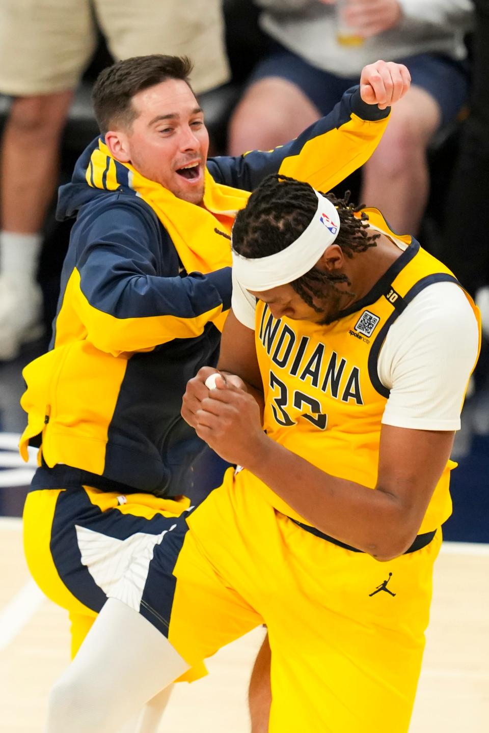 Indiana Pacers guard T.J. McConnell (9) and Indiana Pacers center Myles Turner (33) celebrate after scoring, Sunday, April 28, 2024, during the first round NBA playoff game against the Milwaukee Bucks at Gainbridge Fieldhouse in Indianapolis. The Indiana Pacers defeated the Milwaukee Bucks 126-113. The Pacers are leading the series 3-1.