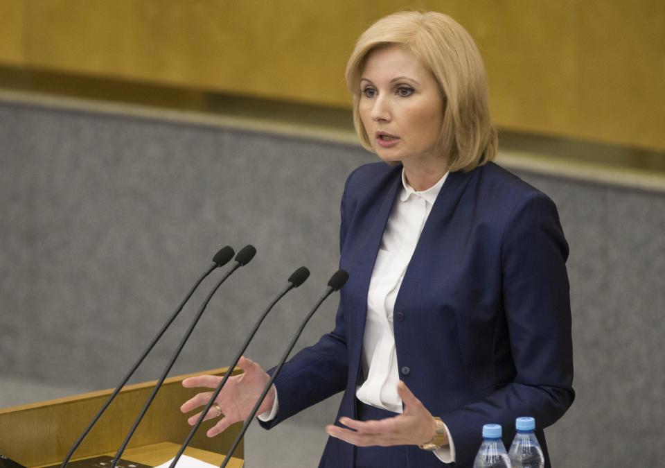 Russian lawmaker Olga Batalina addresses the State Duma (lower parliament house) in Moscow, Russia, Wednesday, Jan. 25, 2017. The State Duma voted overwhelmingly Wednesday to eliminate criminal liability for battery on family members that does not cause bodily harm. The bill that makes battery on a family member punishable by a fine or a 15-day day arrest has yet to be approved in the third reading. (AP Photo/Alexander Zemlianichenko)