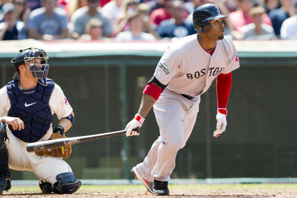 Carl Crawford #13 of the Boston Red Sox hits an RBI double to center during the fifth inning against the Cleveland Indians at Progressive Field on August 12, 2012 in Cleveland, Ohio. (Photo by Jason Miller/Getty Images)