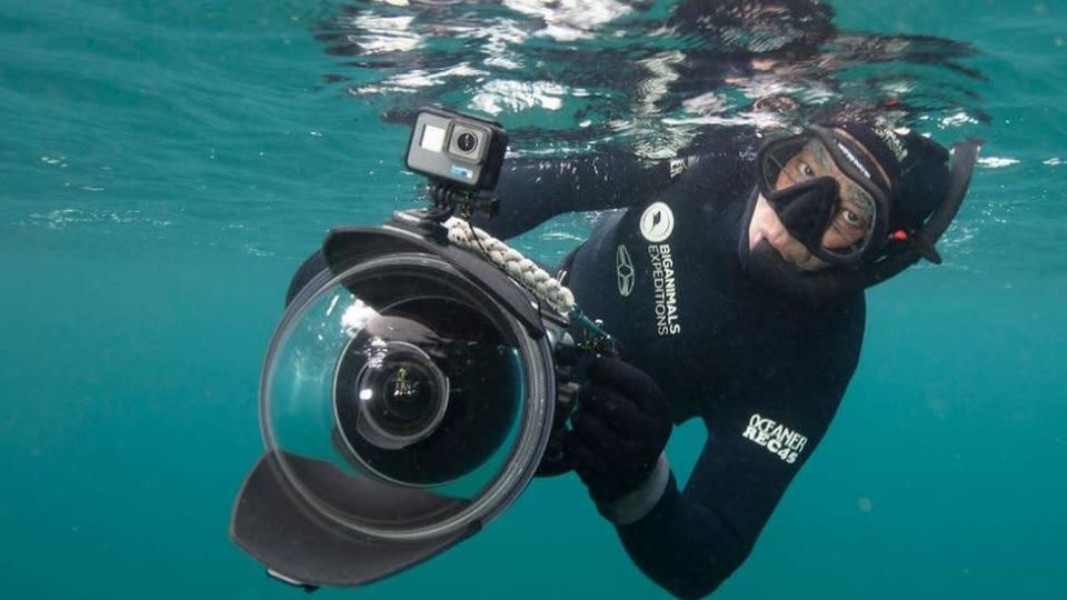 Amos Nachoum holds an underwater camera