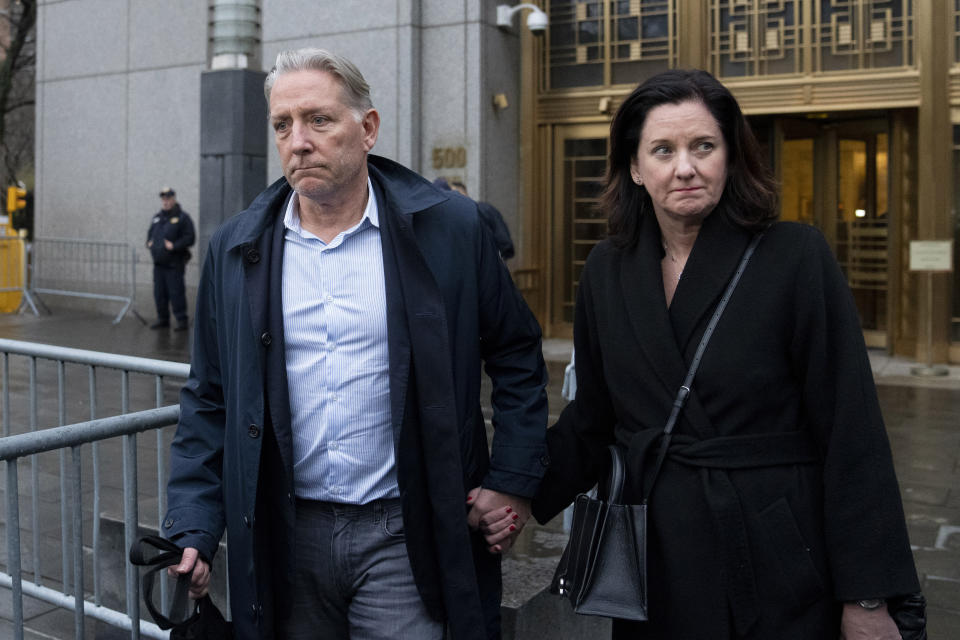 Charles McGonigal, left, former special agent in charge of the FBI's counterintelligence division in New York, left, leaves court, Monday, Jan. 23, 2023, in New York. The former high-ranking FBI counterintelligence official has been indicted on charges he helped a Russian oligarch, in violation of U.S. sanctions. (AP Photo/John Minchillo)