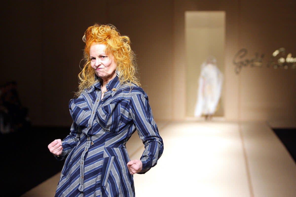 Vivienne Westwood acknowledges the public at the end of Spring/Summer 2008 ready-to-wear collection show in Paris (AFP via Getty Images)