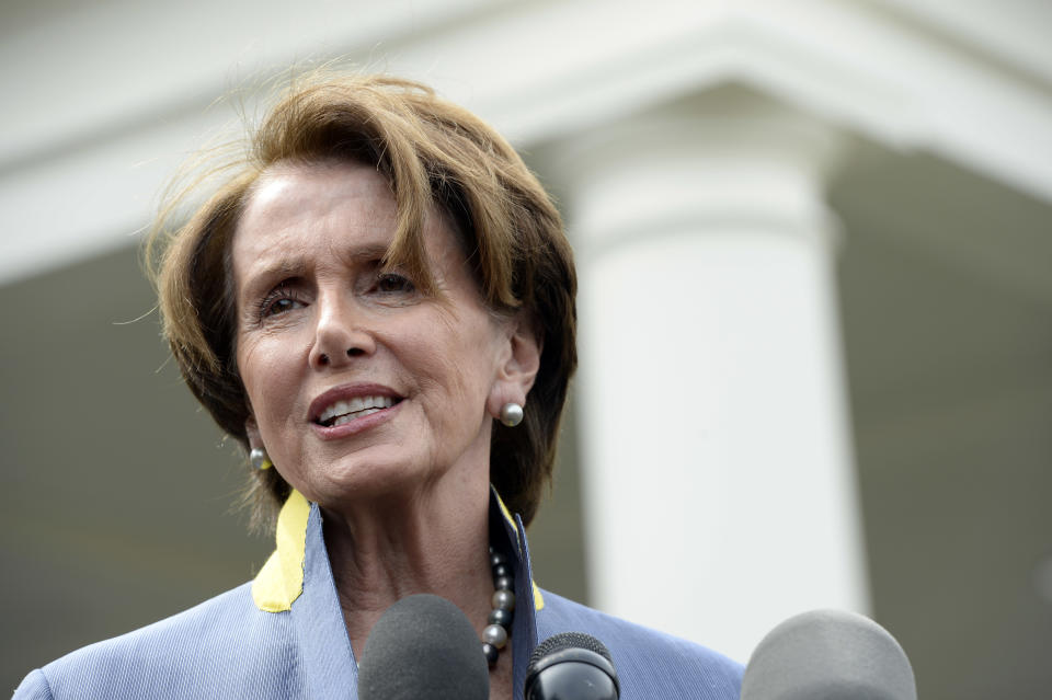 House Minority Leader Nancy Pelosi of Calif. speaks to reporters outside the West Wing of the White House in Washington, Tuesday, April 1, 2014, following her lunch with President Barack Obama. Pelosi was asked several questions about the Affordable Care Act. (AP Photo/Susan Walsh)