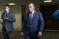 Sen. Ted Cruz, R-Texas, right, leaves a Senate Republican policy meeting on Capitol Hill, Thursday, Sept. 17, 2020, in Washington. (AP Photo/Manuel Balce Ceneta)