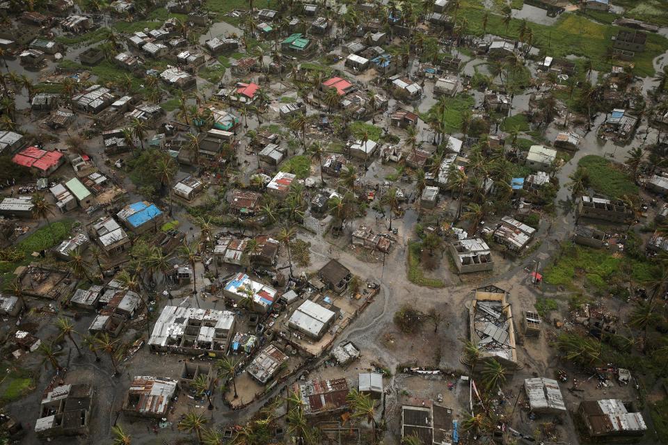 Flooded buildings are seen in Beira, Mozambique, in the aftermath of Cyclone Idai, March 23, 2019.<span class="copyright">Mike Hutchings—Reuters</span>