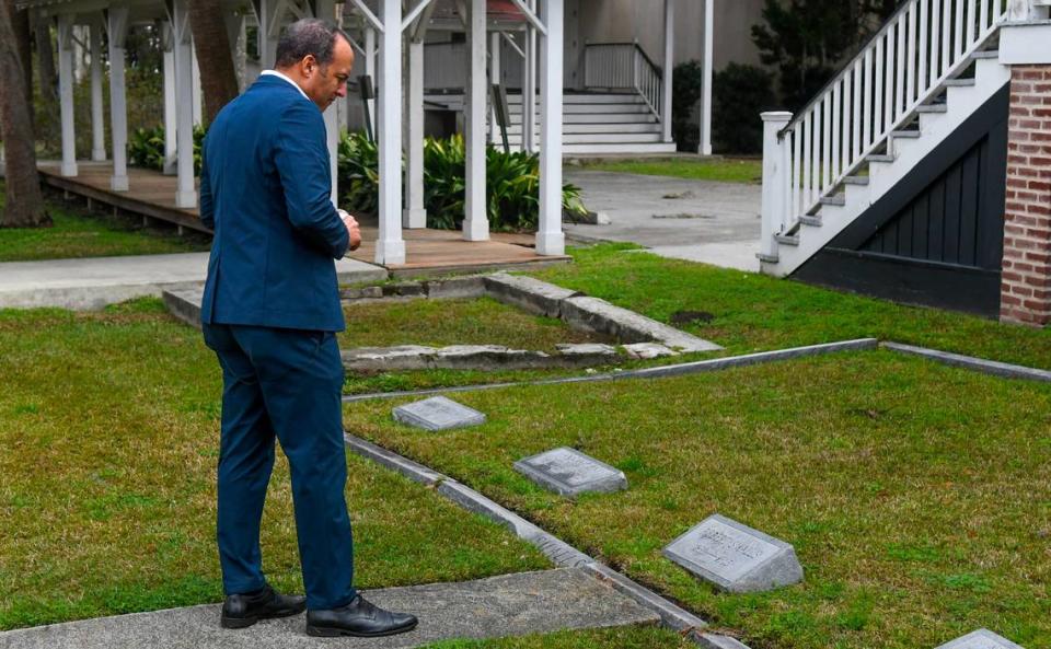 Michael B. Moore, a descendant of Civil War hero Robert Smalls, spends some time at the gravesites of the Smalls family on Thursday, March 7, 2024 at Tabernacle Baptist Church in Beaufort. Moore, a Democrat, officially announced his campaign for the U.S. House of Representatives in South Carolina’s First Congressional District.
