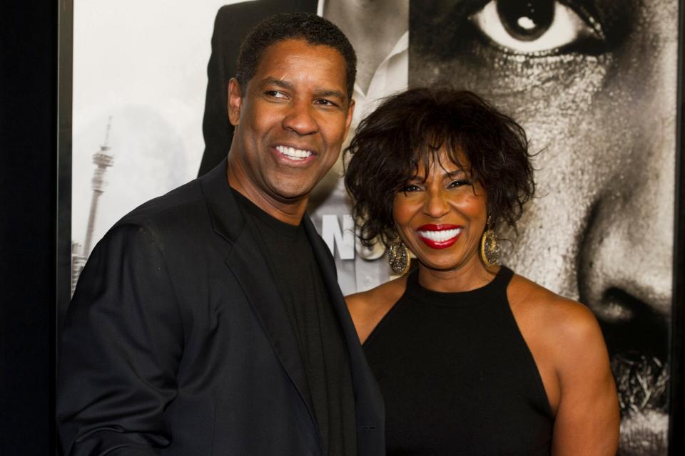 Denzel Washington and his wife Pauletta Pearson attend the premiere of "Safe House", in New York, Tuesday, Feb. 7, 2012.