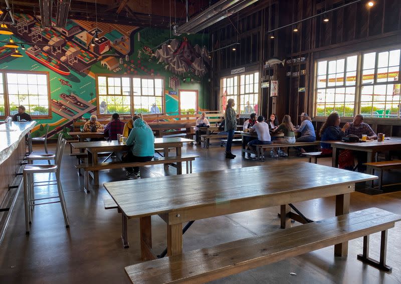 Customers at Almanac Taproom in Alameda, California are seated well apart to abide by California’s strict coronavirus disease (COVID-19) pandemic-era capacity limits