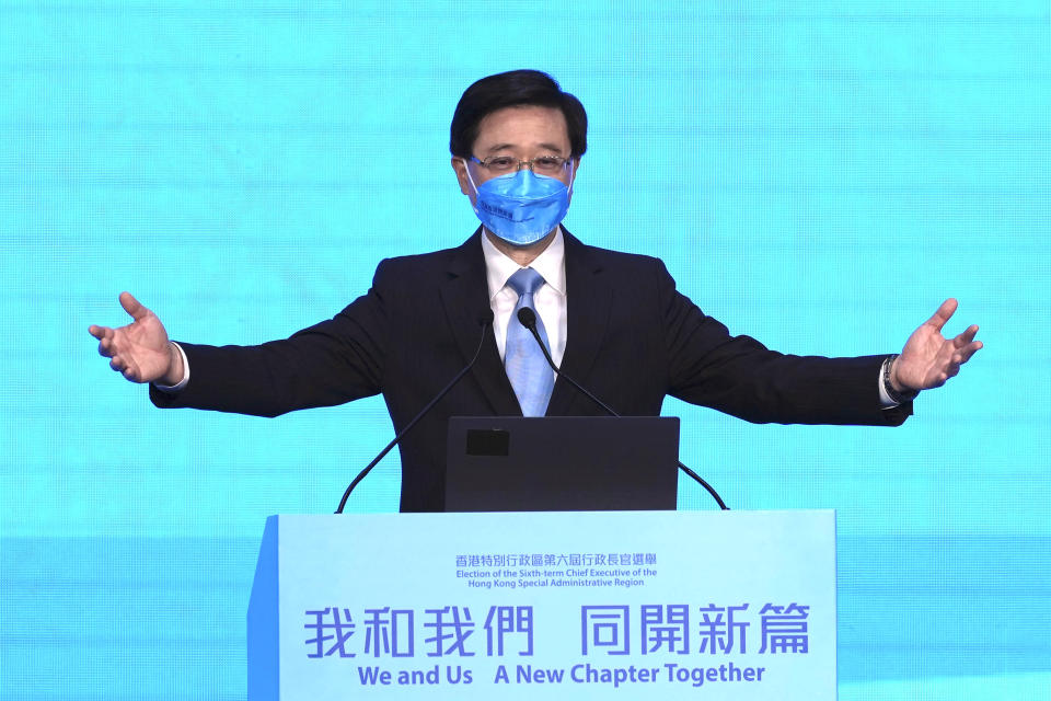 John Lee, former No. 2 official in Hong Kong, and the only candidate for the city's top job, attends his 2022 chief executive electoral campaign rally in Hong Kong, Friday, May 6, 2022. China is moving to install lee as the new leader of Hong Kong in the culmination of a sweeping political transformation that has gutted the Asian financial center's democratic institutions and placed it ever more firmly under Beijing's control. (AP Photo/Kin Cheung)