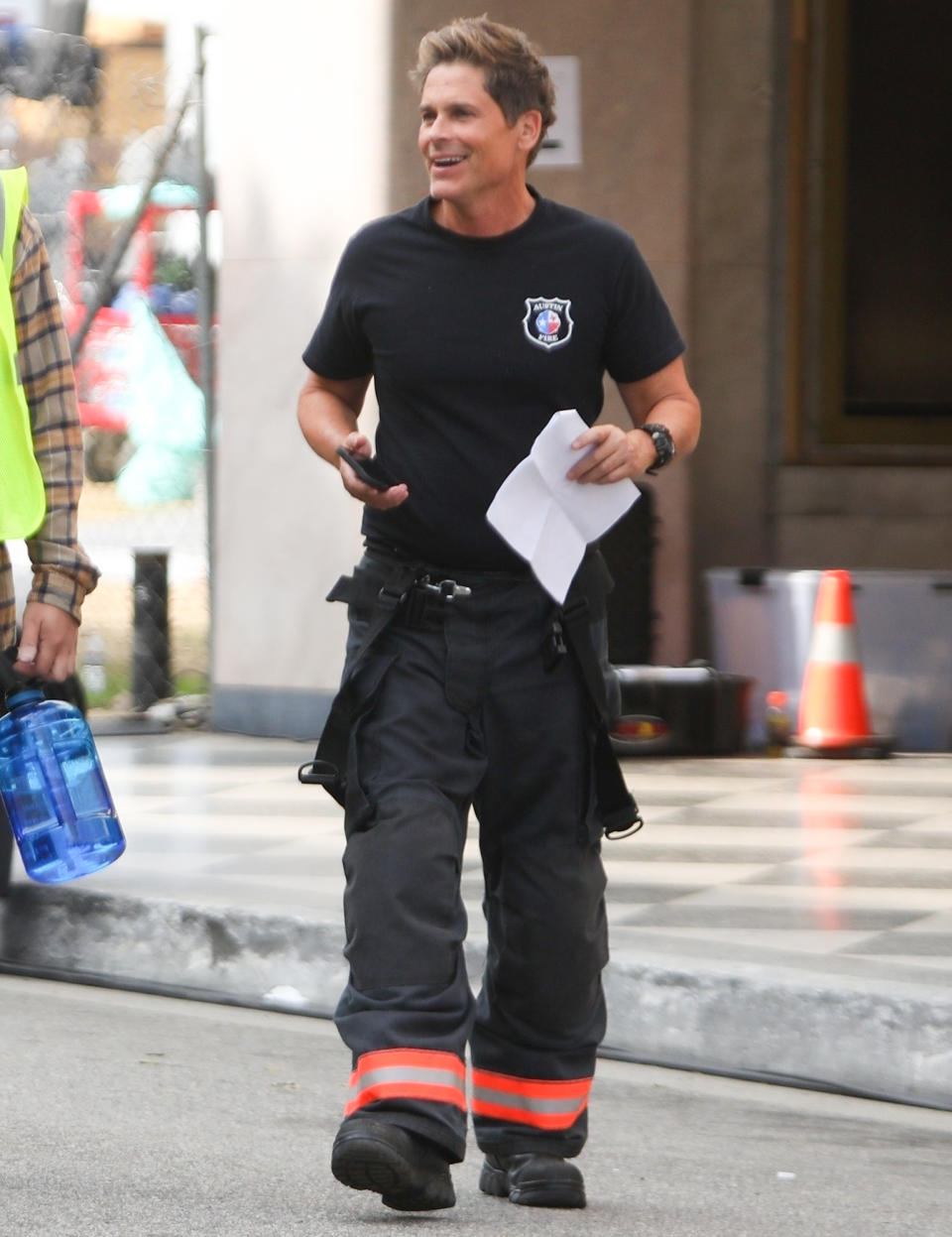 <p>On set and in full costume, Rob Lowe works on a scene for <em>9-1-1: Lone Star</em> in San Pedro, California.</p>