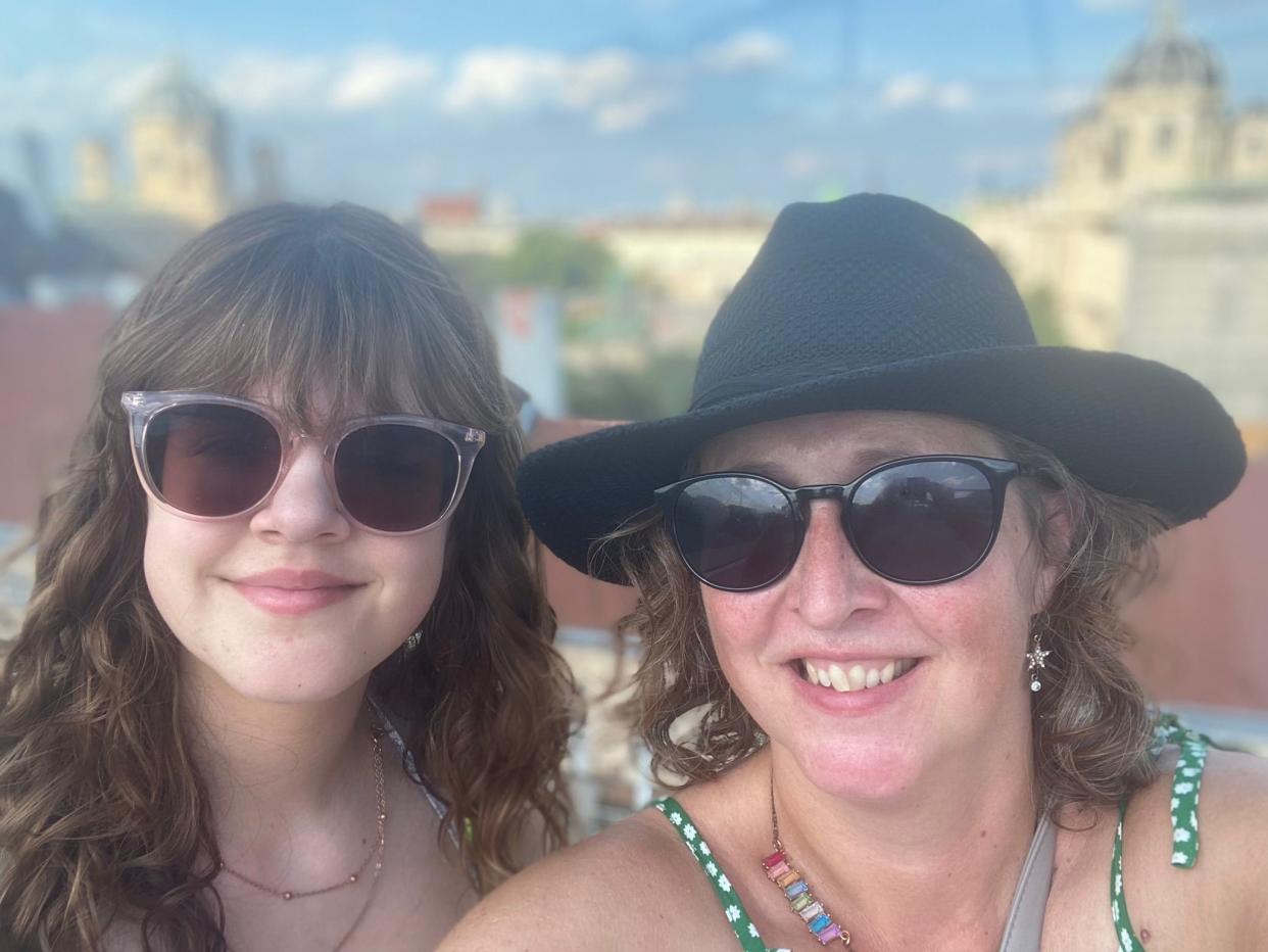 Carla and Catherine Santamaria wearing sunglasses and smiling