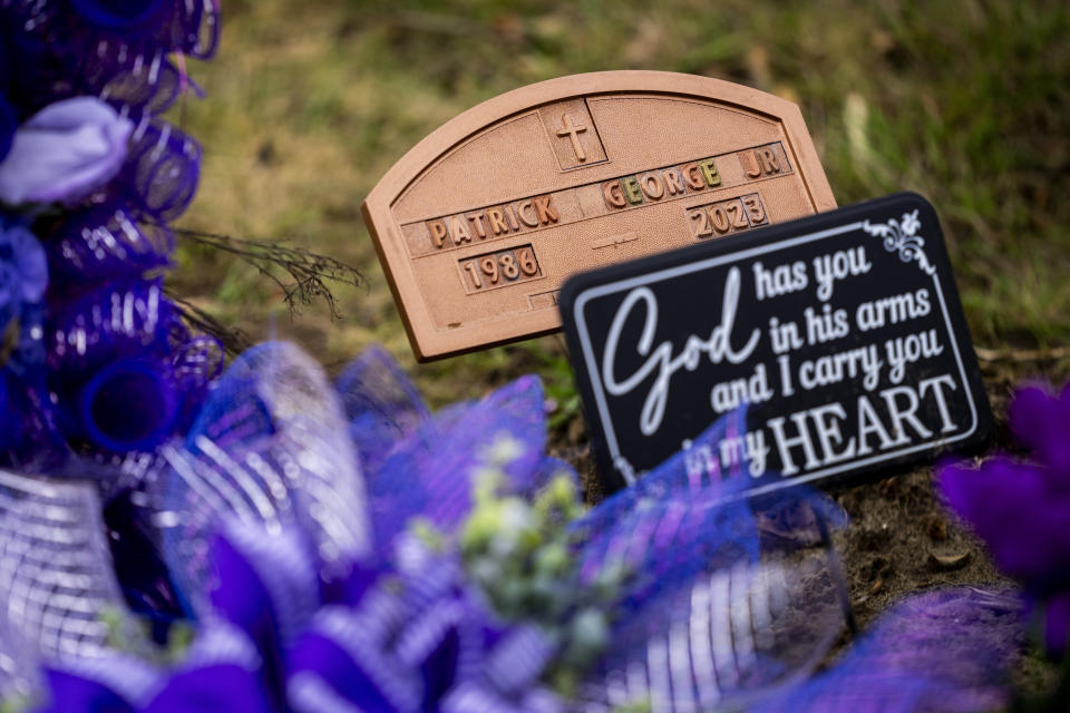 The grave marker for Patrick George Jr., who died last September due to an overdose of street drugs containing the synthetic opioid carfentanil, at the Lummi Nation cemetery on tribal reservation lands, Thursday, Feb. 8, 2024, near Bellingham, Wash. Evelyn Jefferson, a crisis outreach supervisor for Lummi Nation, had to wait a week to bury her son due to several other overdose deaths in the community. (AP Photo/Lindsey Wasson)