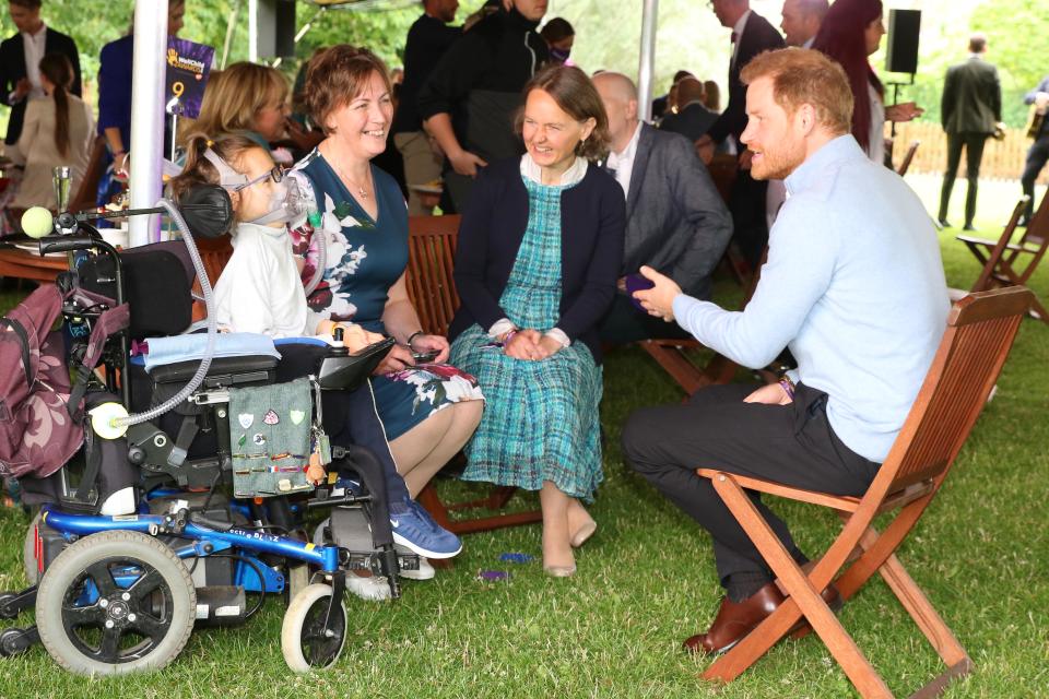 WellChild Awards 2021 in association with GSK at Kew Gardens, London - Remarkable children and young people and hard-working professionals from across the UK have been named winners in the prestigious national 2021 WellChild Awards, in association with GSK. They received their awards earlier today (June 30th) in a surprise visit from WellChild Patron, The Duke of Sussex at a private garden party at Kew Gardens, in London -   Outstanding Professional Award winner Anna Marie McLachlan with the family she supports with The Duke of Sussex   - 30.6.2021

Picture by Antony Thompson - Thousand Word Media, NO SALES, NO SYNDICATION. Contact for more information mob: 07775556610 web: www.thousandwordmedia.com email: antony@thousandwordmedia.com

The photographic copyright (© 2021) is exclusively retained by the works creator at all times and sales, syndication or offering the work for future publication to a third party without the photographer's knowledge or agreement is in breach of the Copyright Designs and Patents Act 1988, (Part 1, Section 4, 2b). Please contact the photographer should you have any questions with regard to the use of the attached work and any rights involved. 