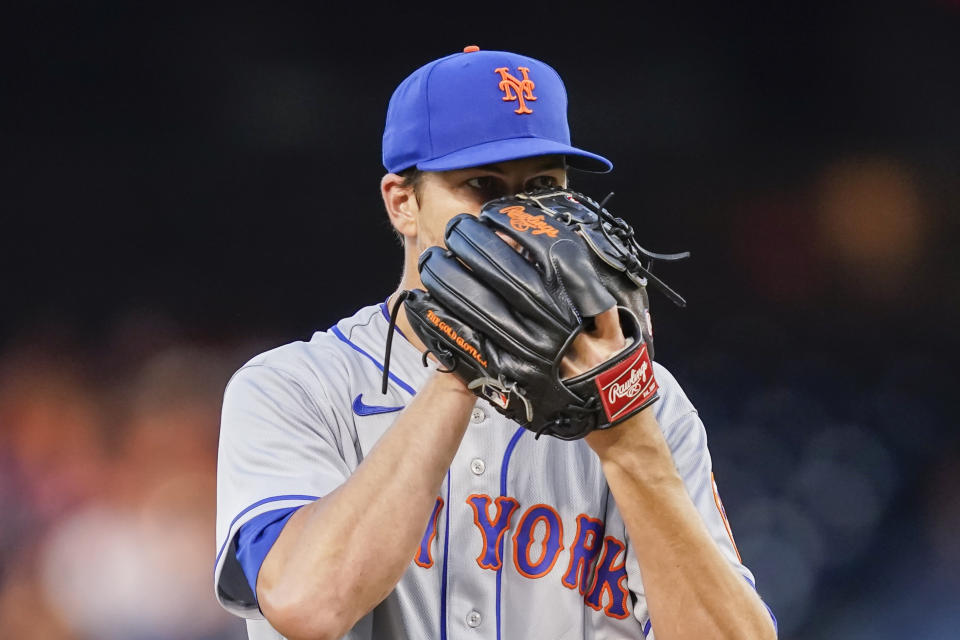 New York Mets starting pitcher Jacob deGrom throws during a baseball game against the Washington Nationals at Nationals Park, Tuesday, Aug.  2, 2022, in Washington.  (AP Photo/Alex Brandon)