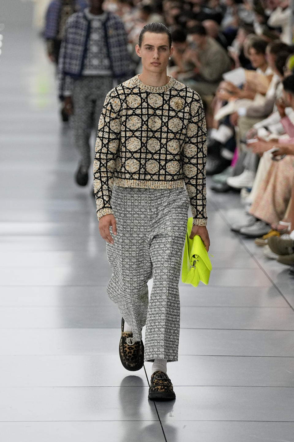 A model wears a creation for the Dior Menswear Spring/Summer 2024 fashion collection presented in Paris, Friday, June 23, 2023. (AP Photo/Michel Euler)