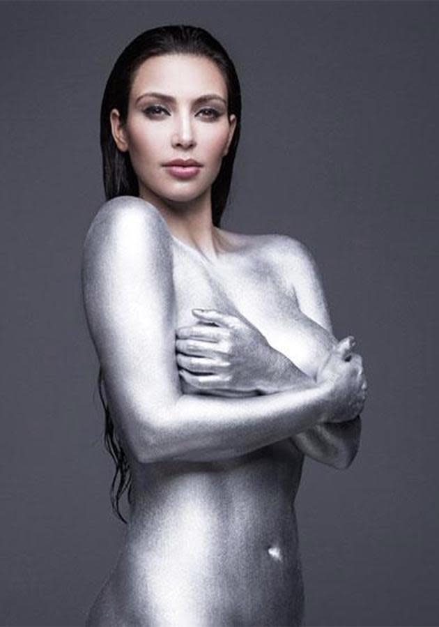 And it isn't just at home that she plays up the sex appeal. Here she is wearing nothing but silver paint, for <i>W</i> magazine.