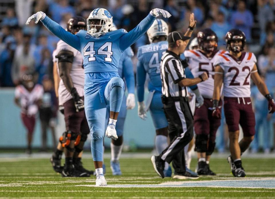 North Carolina’s Randy Caldwell (44) reacts after a sack of Virginia Tech quarterback Jason Brown (1) in the fourth quarter on Saturday, October 1, 2022 at Kenan Stadium in Chapel Hill, N.C. Robert Willett/rwillett@newsobserver.com