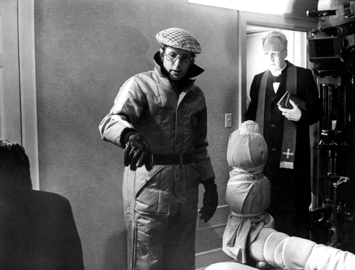 William Friedkin directing Max von Sydow on the set of <em>The Exorcist.</em> (Warner Bros./Courtesy of Everett Collection)