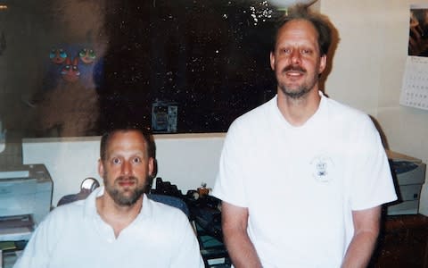 This undated photo provided by Eric Paddock shows him at left with his brother, Las Vegas gunman Stephen Paddock  - Credit: Courtesy of Eric Paddock